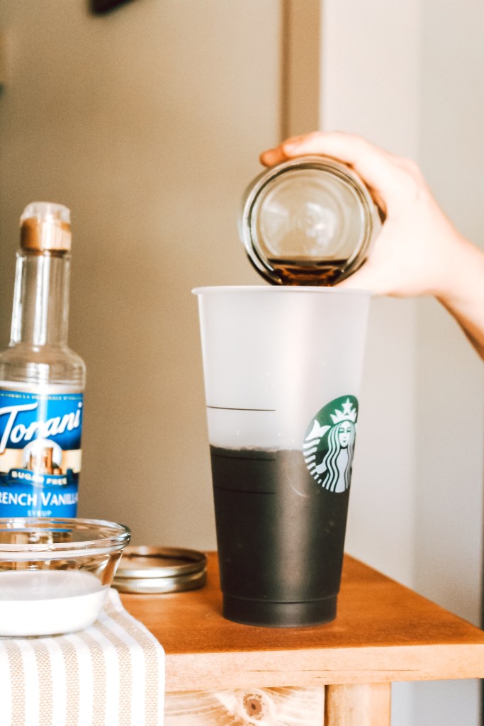 Coffee pouring into cup